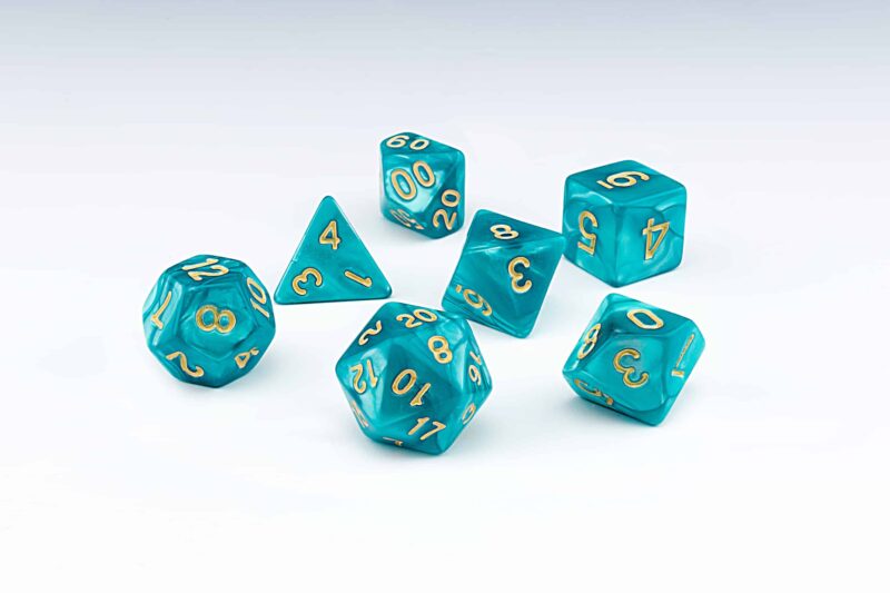 Cascade light blue pearlescent set of 7 RPG dice with Gold numbers from Northumbrian Tin Soldier on a white background