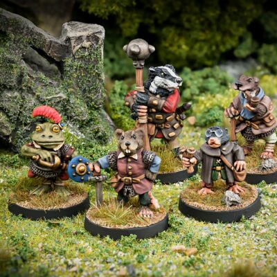 Guardians of the riverbank Ratty Toad Badger Mole and Otter 28mm fanstasy miniatures in high quality white metal from Northumbrian Tin Soldier beside the bridge standing on Grass