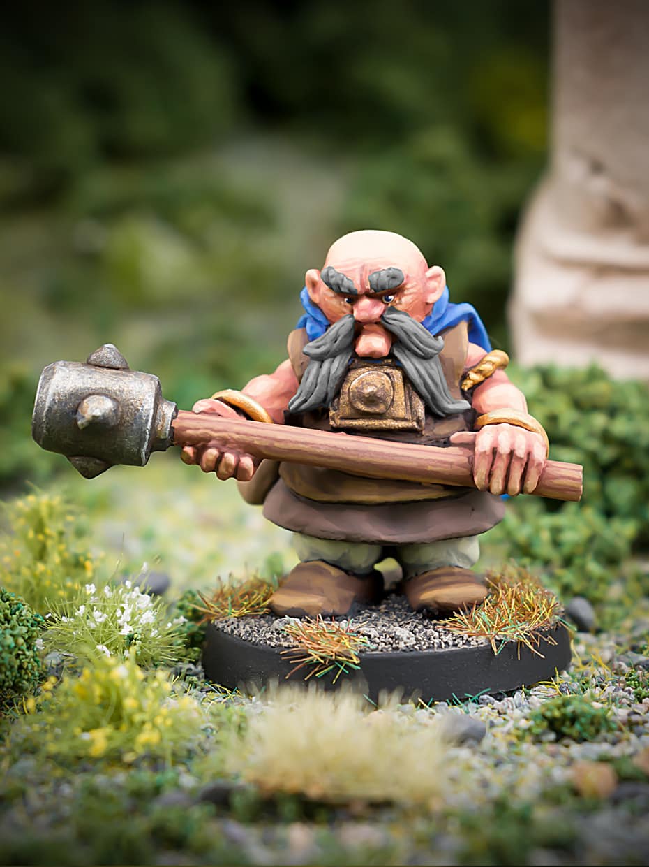 Malfolio Ironbraid male Dwarf with large club 28mm fanstasy miniatures in high quality white metal from Northumbrian Tin Soldier in the Darkewood standing on Grass