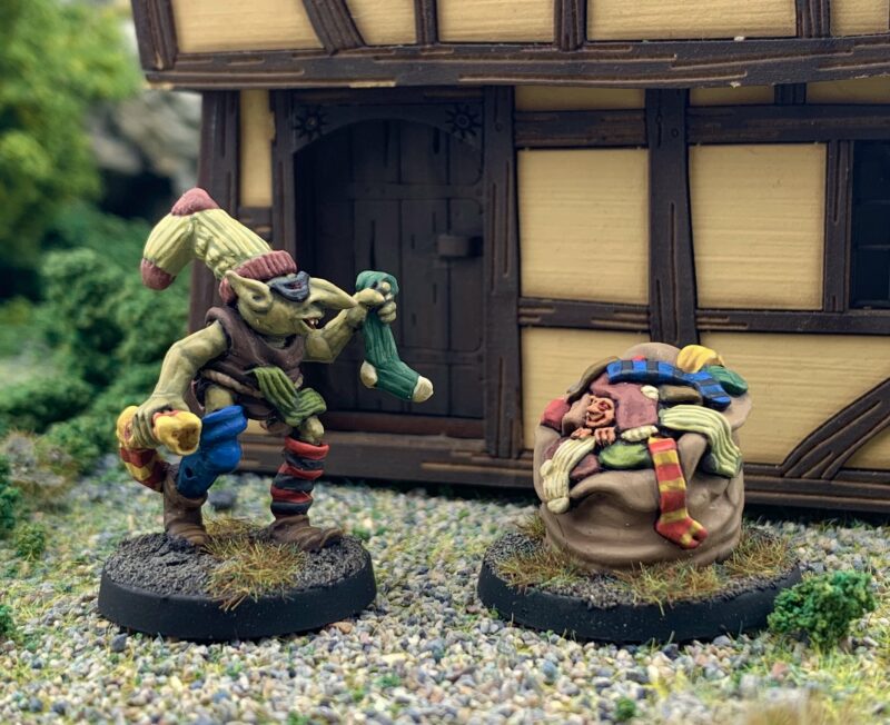 Sock Thief Goblin and Sock Sack 28mm fanstasy miniatures in high quality white metal from Northumbrian Tin Soldier in a Village standing on Gravel